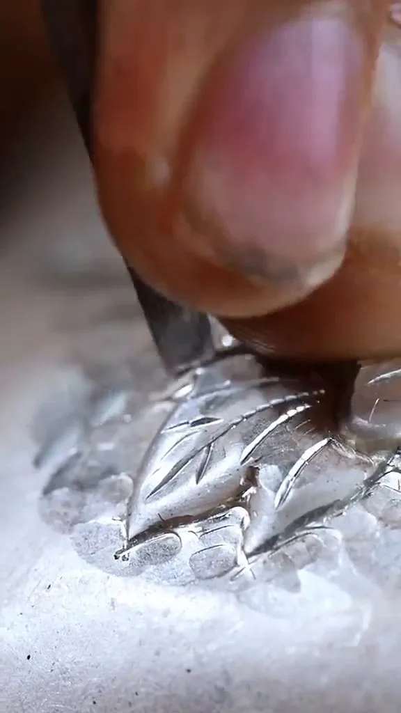 Chasing tool at work — chasing displaces metal without removing any
