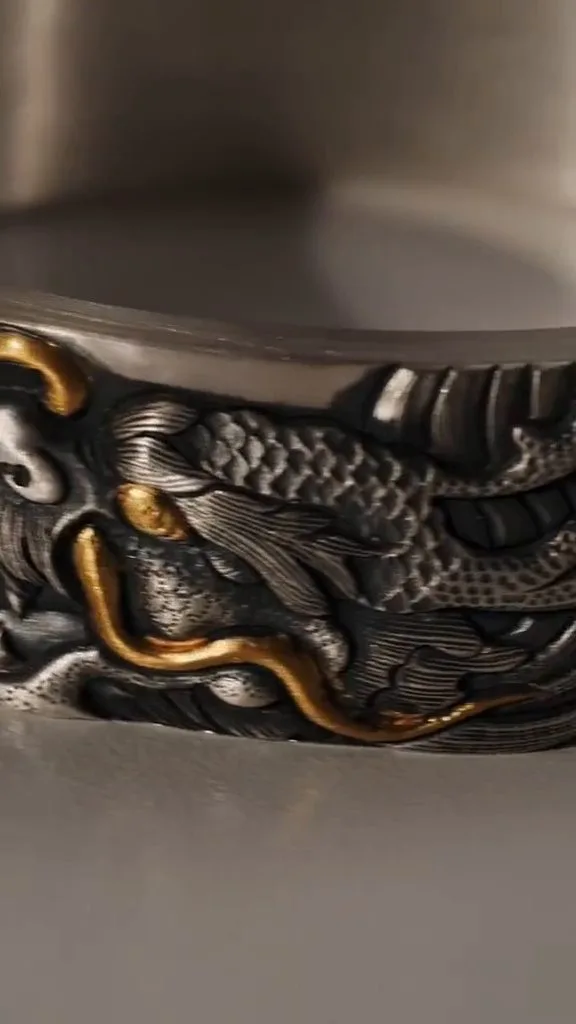 Dragon bracelet detail — 999 fine silver hand-chased dragon scales